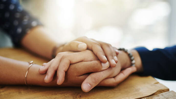 holding hands cremation articles image