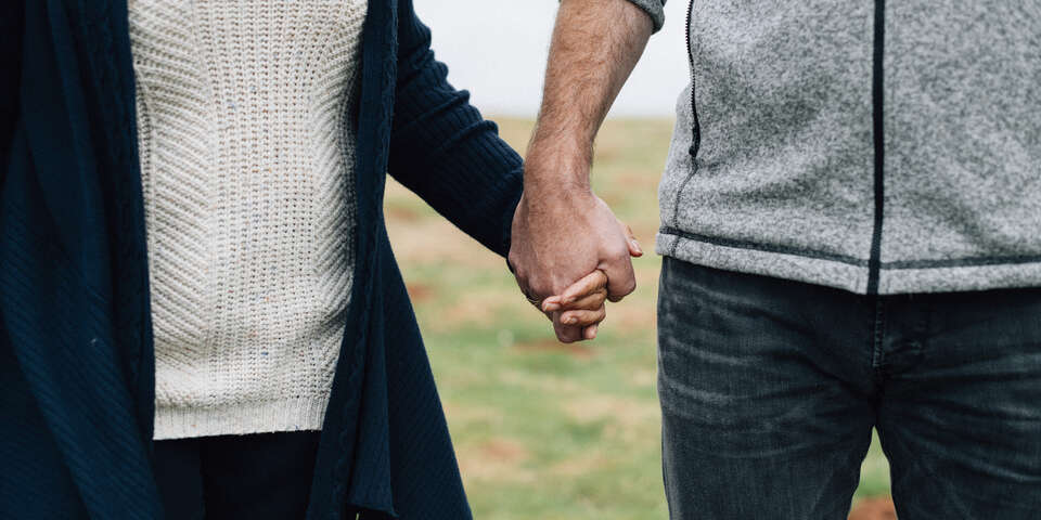 couple holding hands