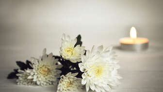 Candle-and-flowers.jpg?sw=336&cx=0&cy=0&cw=2500&ch=1414&q=60