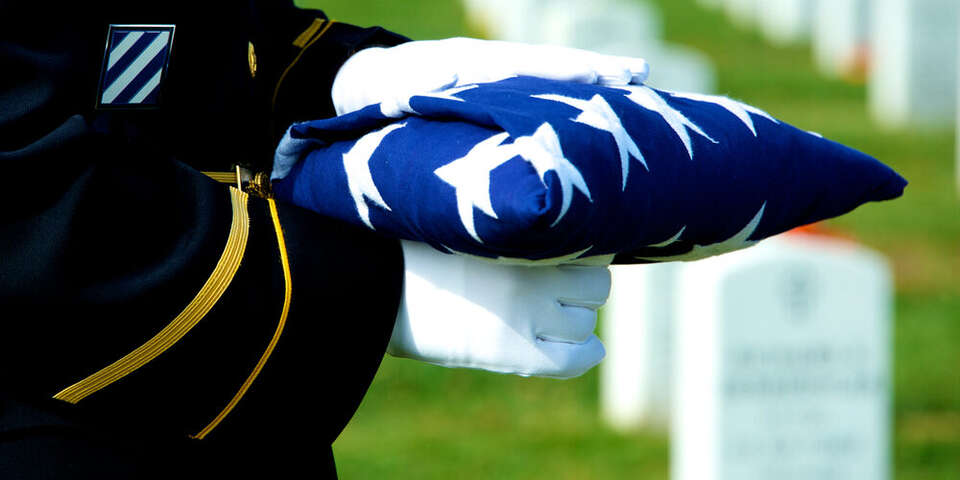 Military flag in cemetery