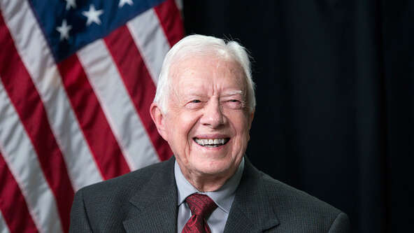 president-jimmy-carter-flag-bg.jpg?sw=592&cx=0&cy=0&cw=1200&ch=675&q=60